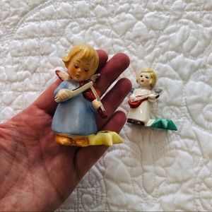 Two vintage sacrart musical angel candle holders